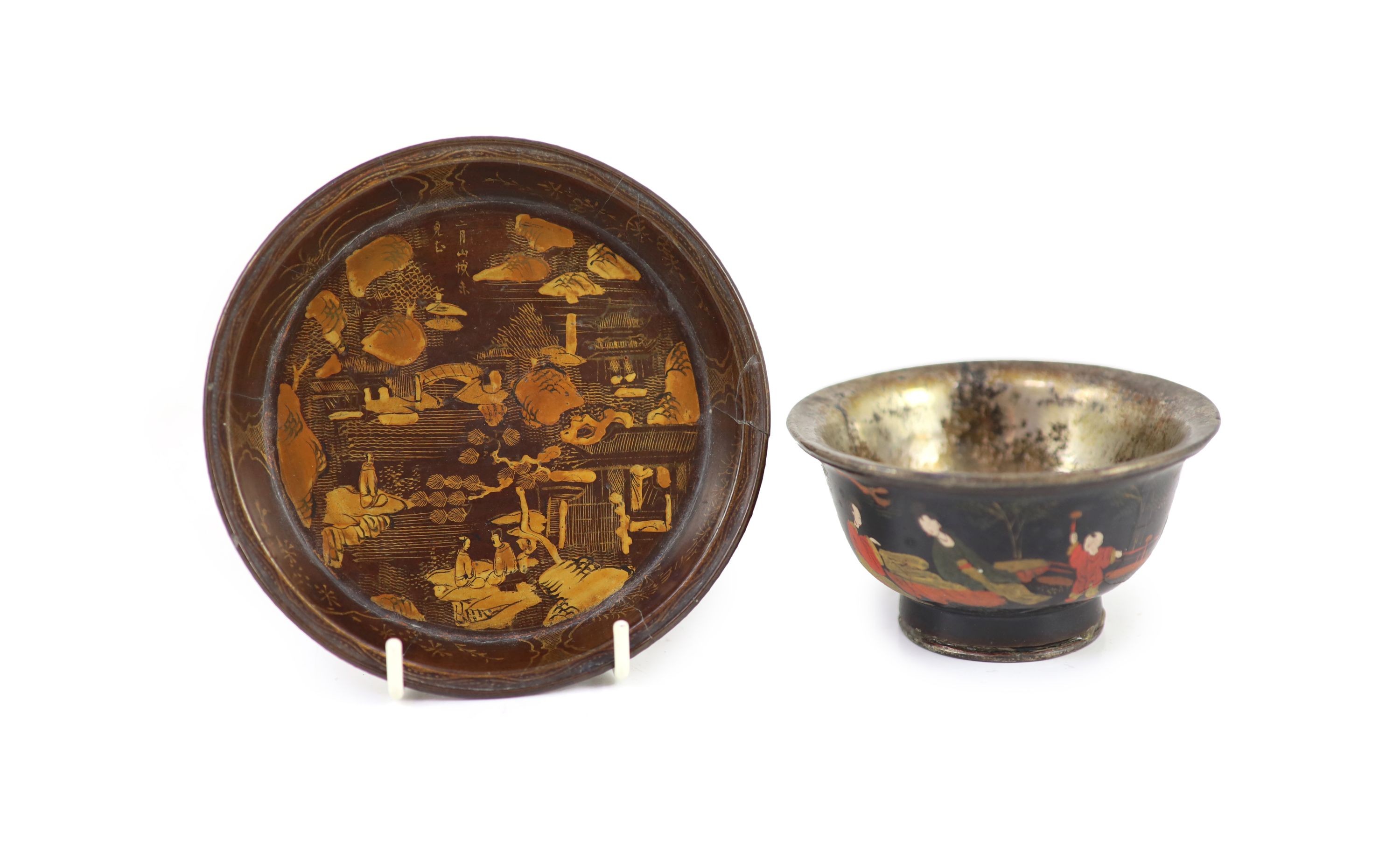 A Chinese late Ming lacquer cup and a similar dish, 17th century